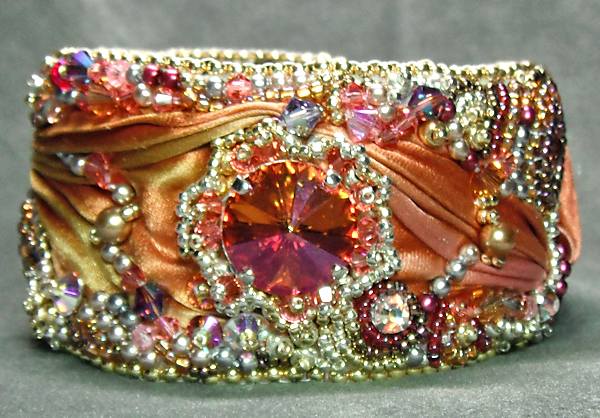 With the sunrise colors in this bead embroidery cuff, the name had to reflect that. Thus came the name, "Aurora's Jewels".